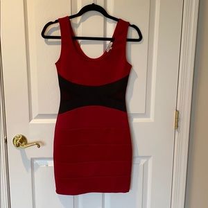 Medium deep red dress with sheer cut outs